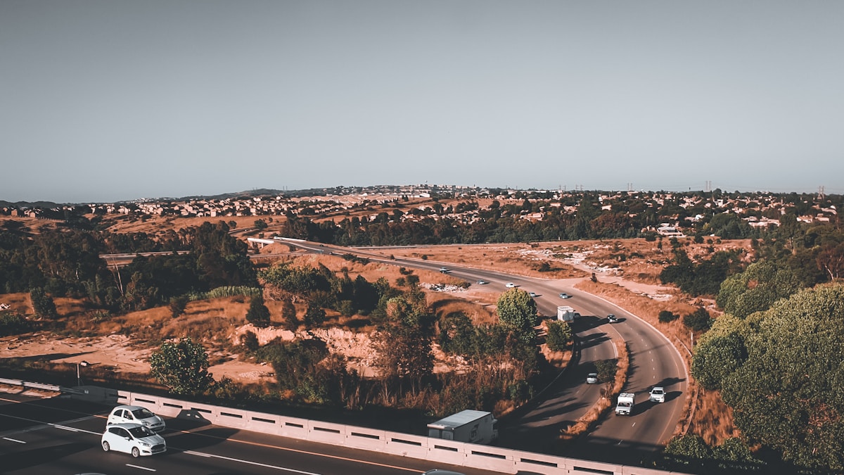 South African highway with traffic — airport transfer guide, South Africa