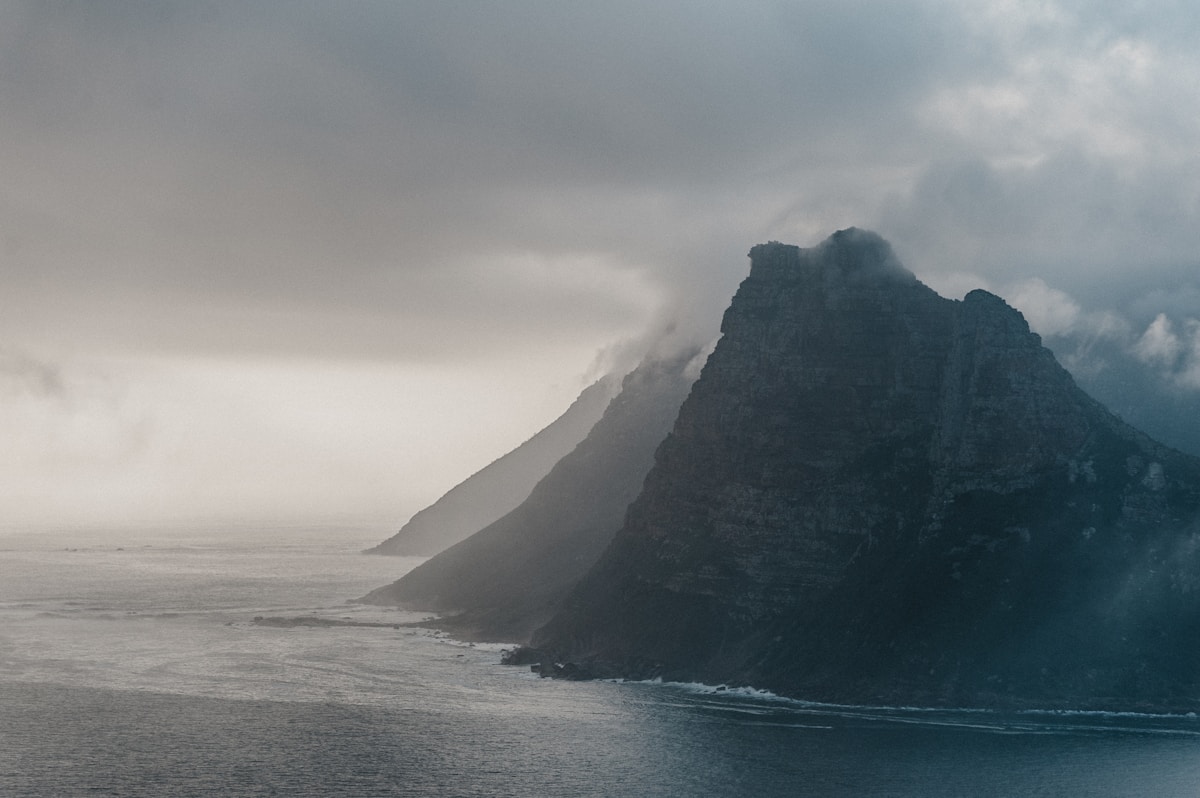 Dramatic coastal cliffs of the Cape Peninsula rising above the Atlantic Ocean, South Africa