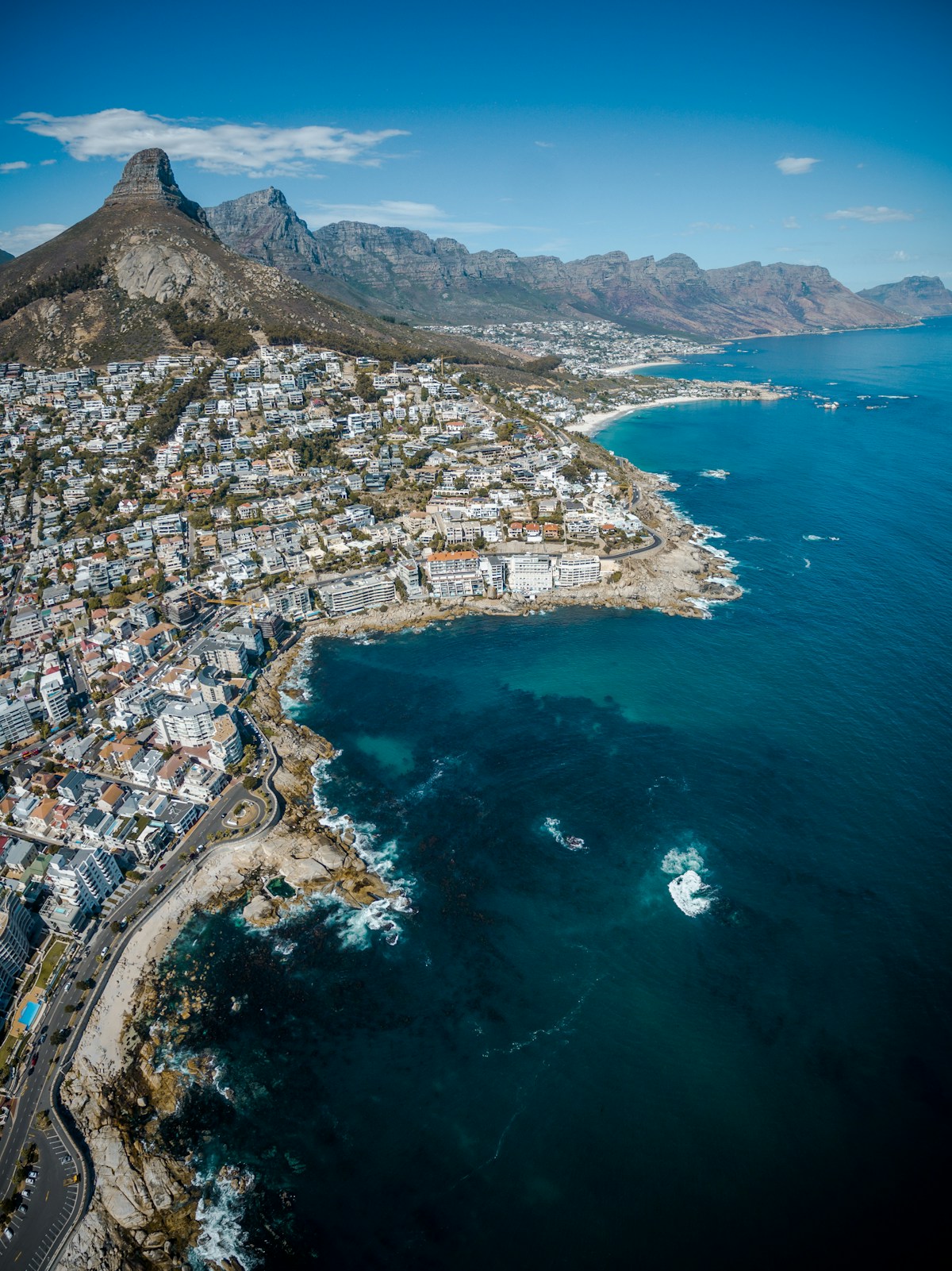 Aerial view of Cape Town with Lion's Head, Clifton beaches and the Twelve Apostles mountain range, South Africa