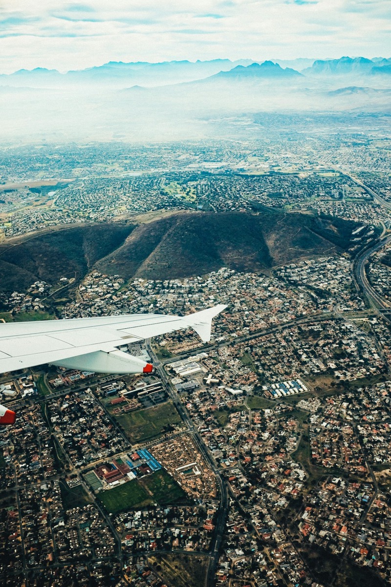 Aerial view of Cape Town neighbourhoods with the surrounding mountain ranges