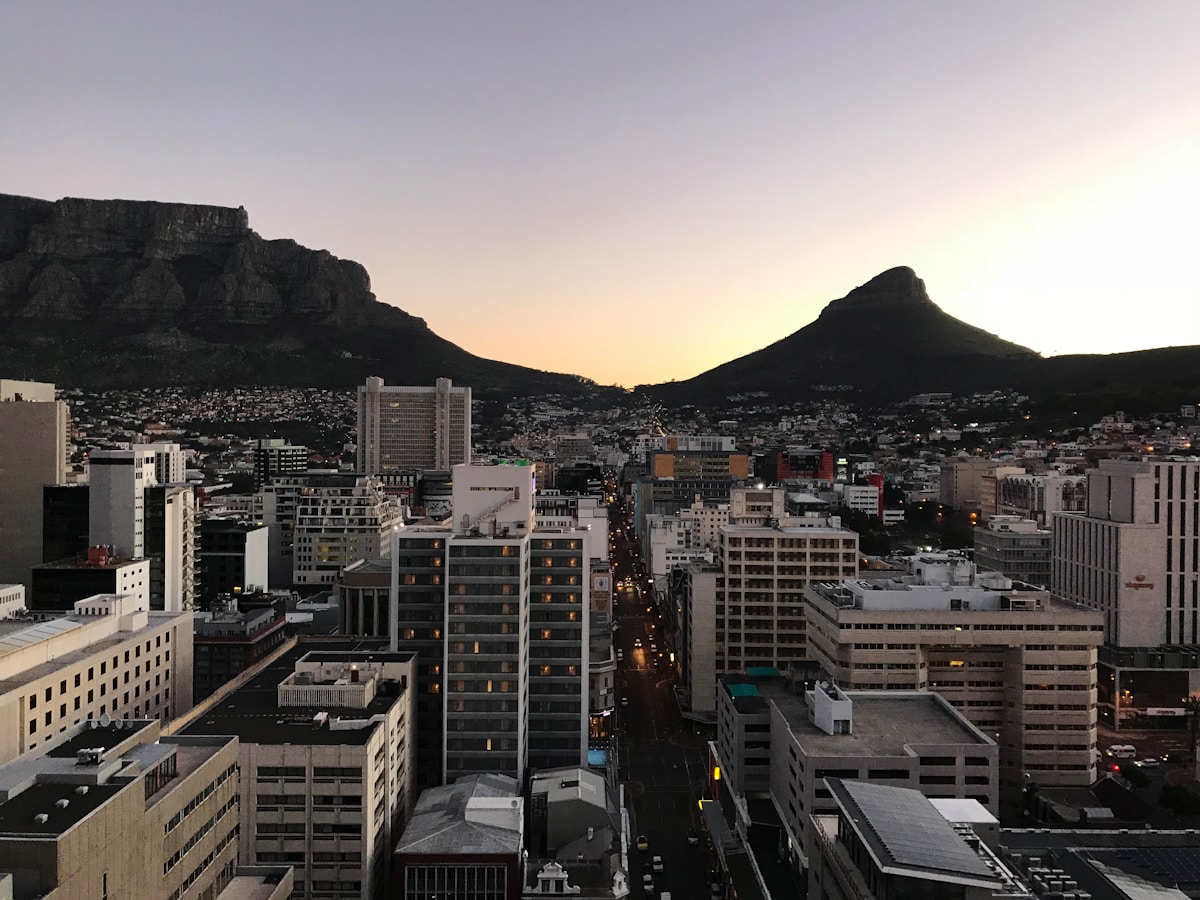 Cape Town city skyline at dusk with Table Mountain and Lion's Head, South Africa