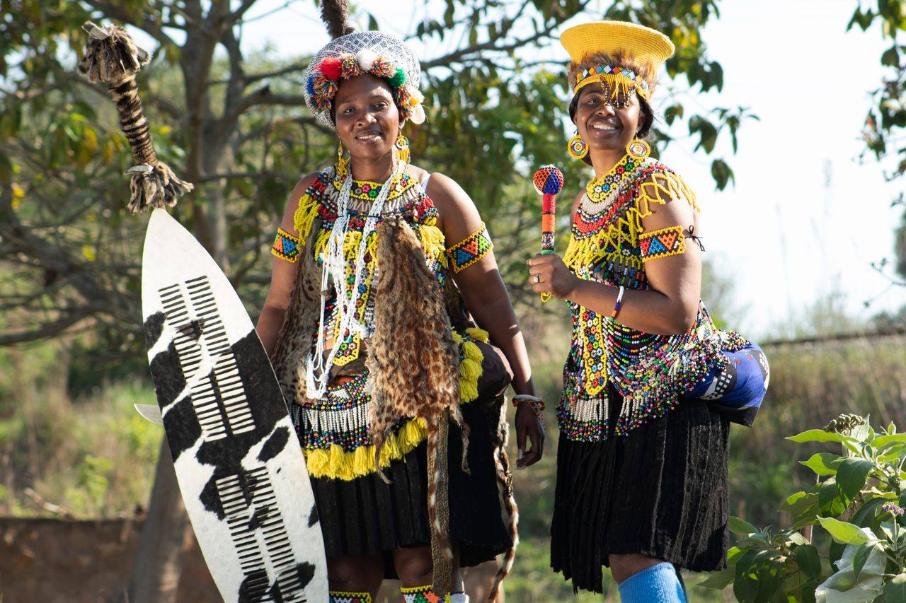 Two women in traditional Zulu beadwork attire in KwaZulu-Natal, South Africa