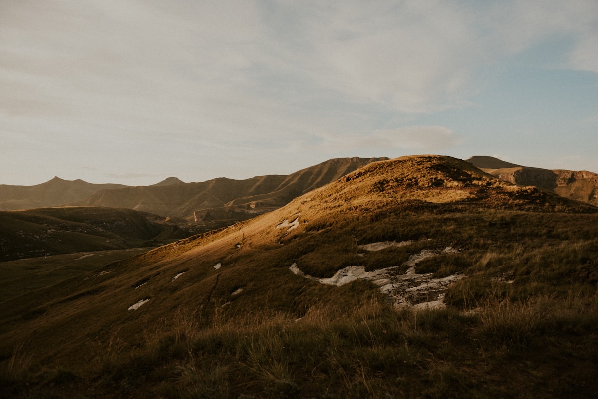 Golden sandstone hills of the Free State Eastern Highlands at dusk, Golden Gate Highlands National Park, South Africa