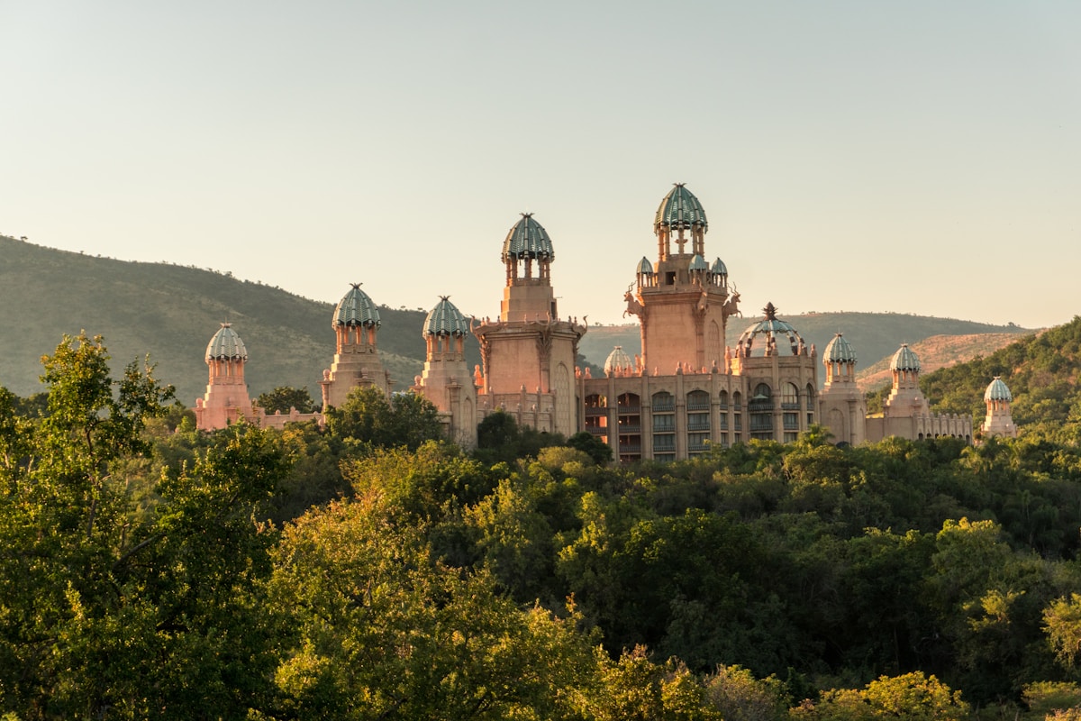 Palace of the Lost City at Sun City resort surrounded by trees, North West province, South Africa